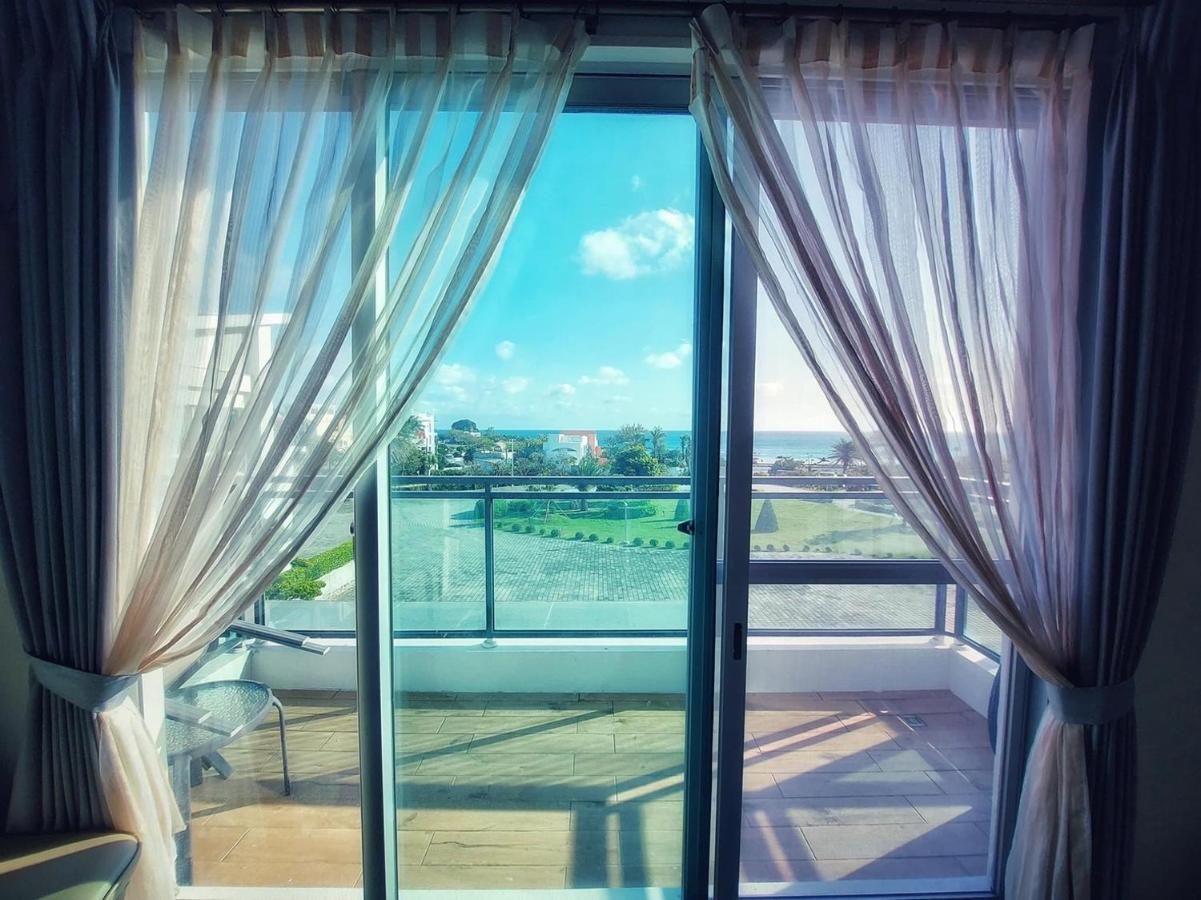 Hotel 墾丁椰林 海灘文旅 à Cape Eluanbi Extérieur photo