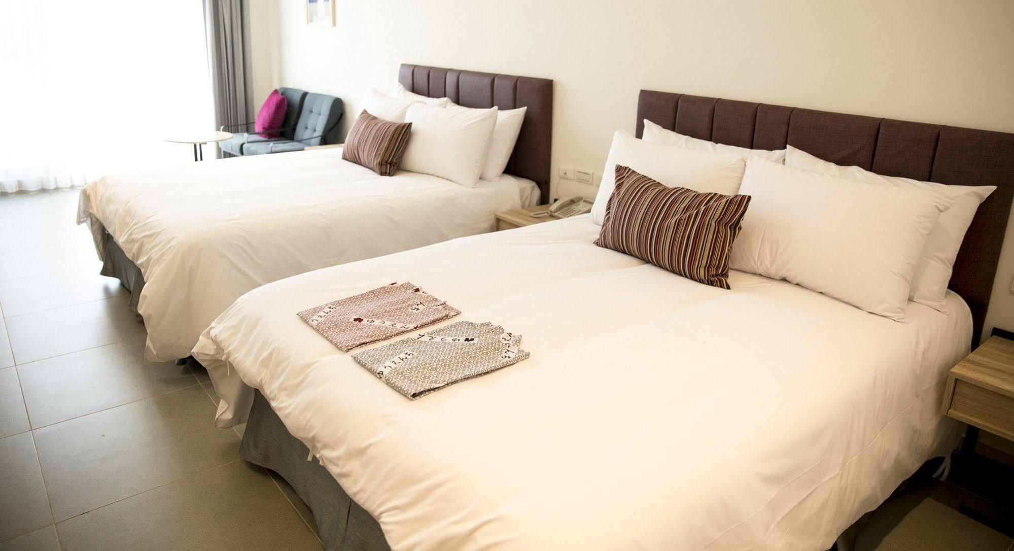 Hotel 墾丁椰林 海灘文旅 à Cape Eluanbi Extérieur photo